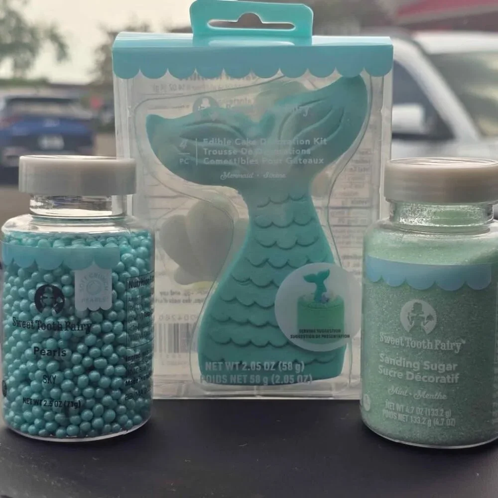 Mermaid birthday cake toppers and sprinkles all new in box unopened. Birthday d